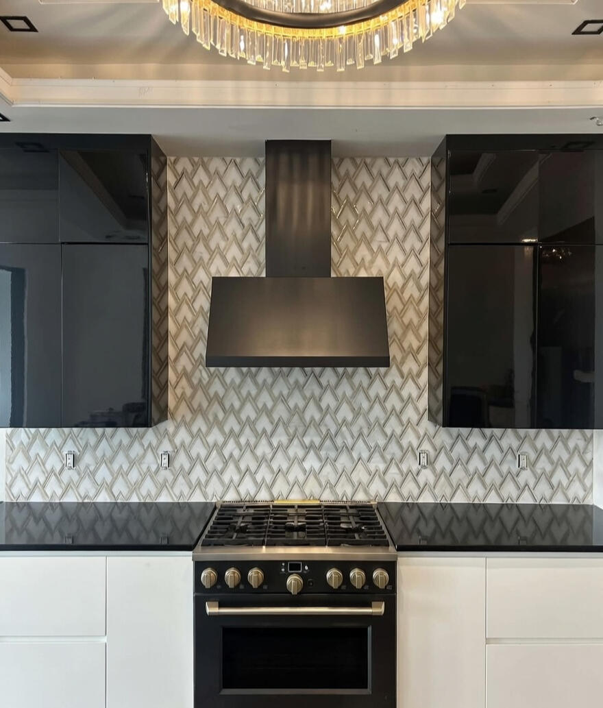Precision-Installed Sleek Contemporary Chevron-Patterned Marble Backsplash